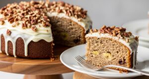 sliced banana bundt cake with pecans