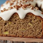 banana bundt cake with glaze and pecans
