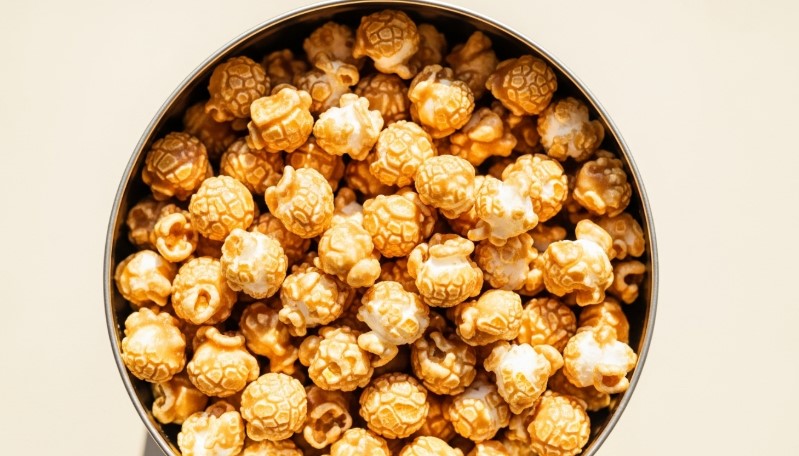 best caramel popcorn with peanuts in a holiday tin