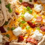 cheesy crack chicken in slow cooker with bacon