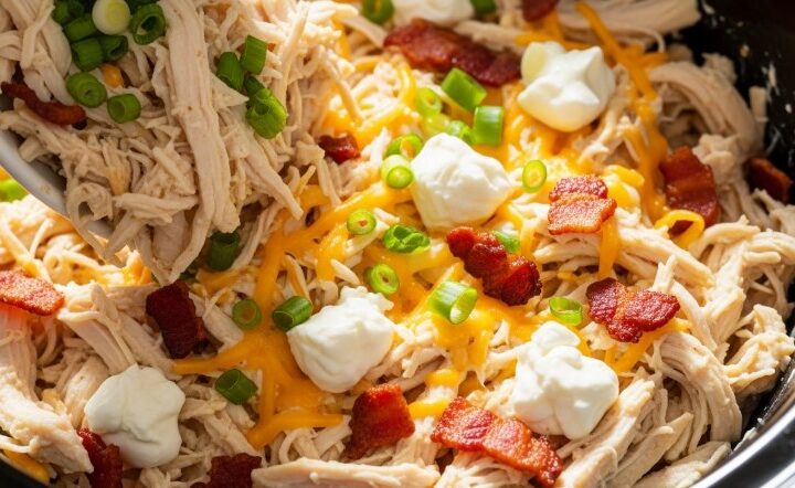 cheesy crack chicken in slow cooker with bacon